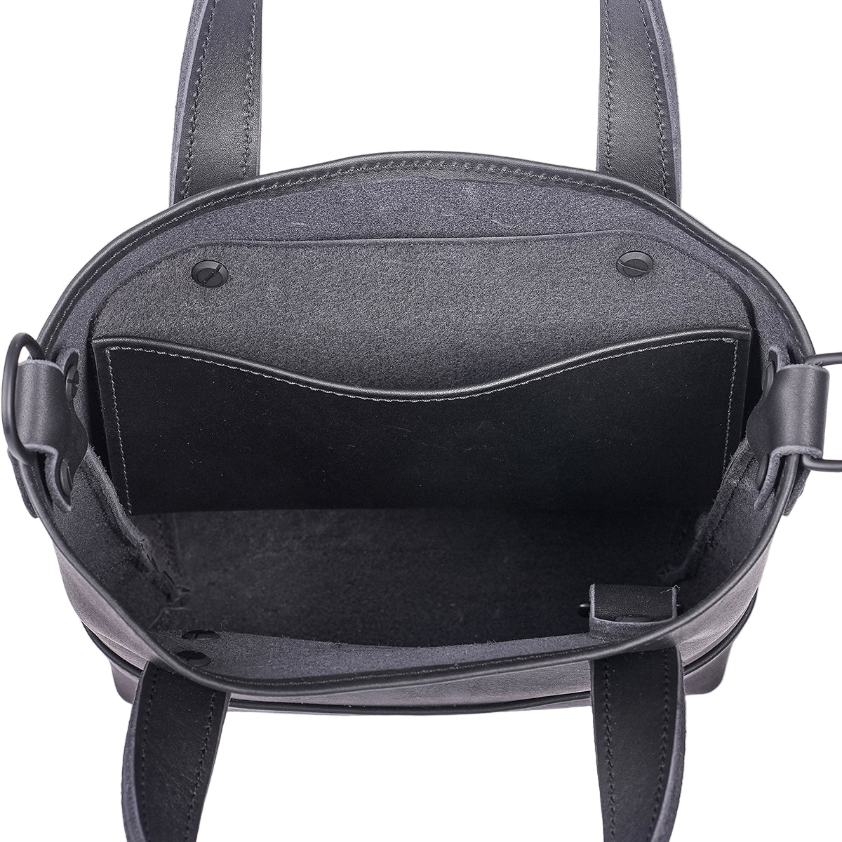 Interior pocket of Black Small Tote handbag with visible stitching details from Pask Fine Goods